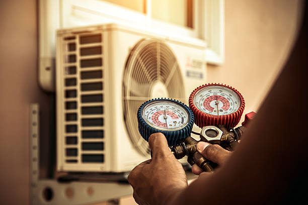 Professional Heat Pump Repair technician working in Broadway, NJ